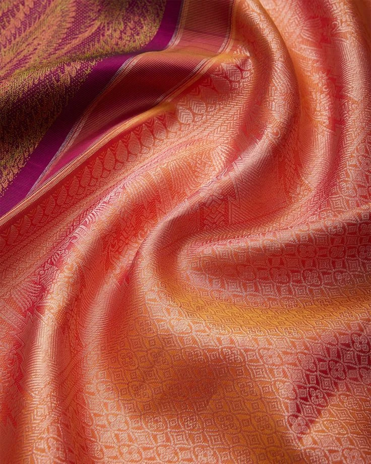 Orange and gold silk with a woven pattern